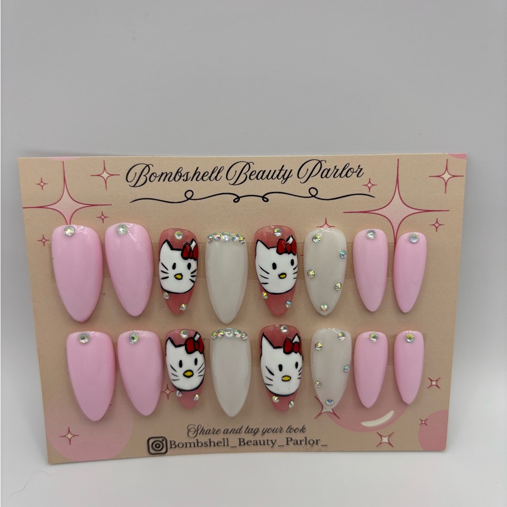 Hello Kitty Nails hand painted nails medium length almond shape bling nails